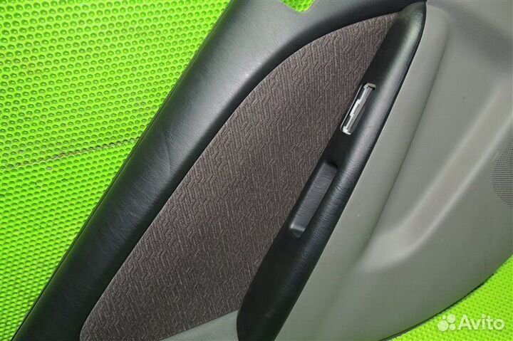 Обшивка двери задняя левая Toyota Caldina AT211