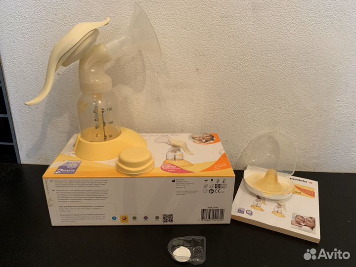 Молокоотсос ручной Medela Harmony накладки