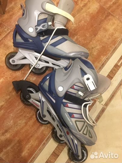 Роликовые коньки