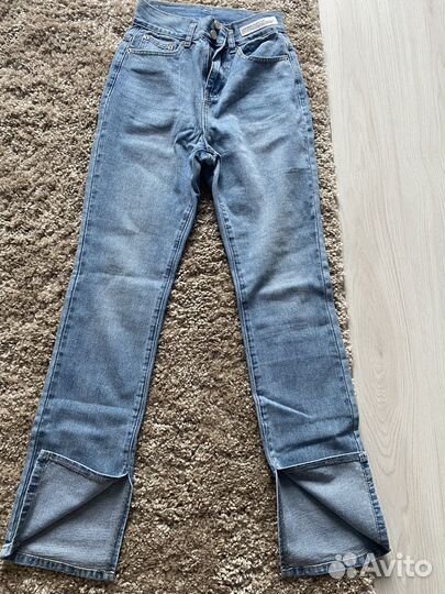 Джинсы клеш