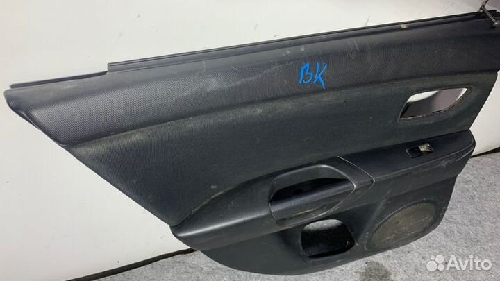 Обшивка двери задняя левая Mazda 3 BK