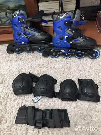 Роликовые коньки