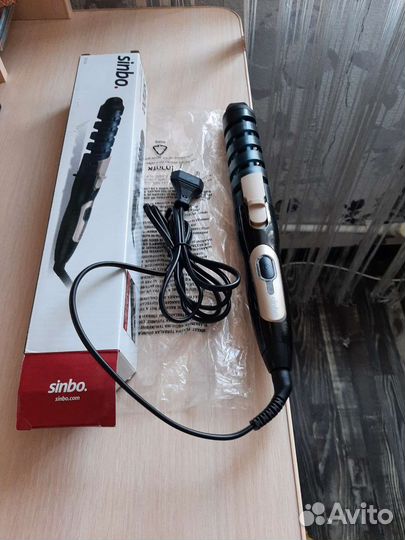 Новые щипцы для завивки волос