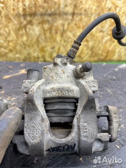 Суппорт тормозной передний левый Renault Logan 2