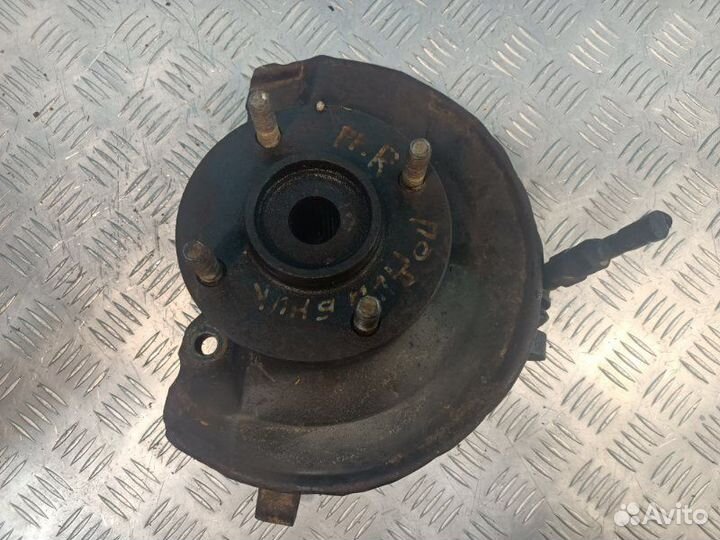 Кулак поворотный передний правый Mitsubishi Lancer