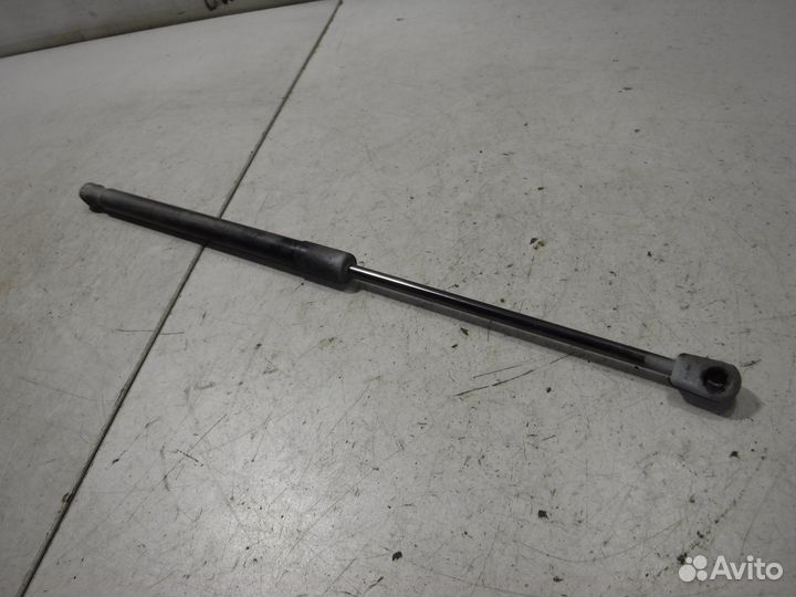 Амортизатор двери багажника Opel Astra H