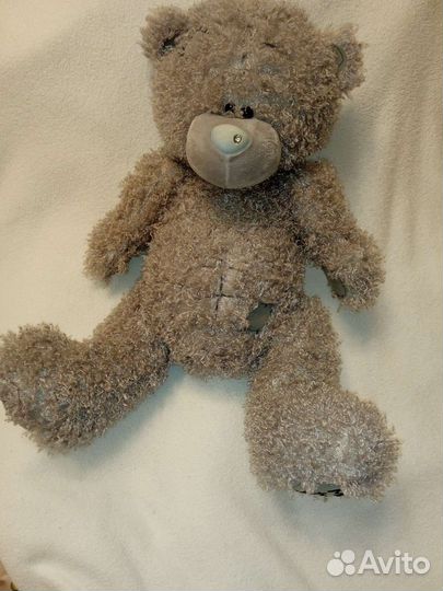 Большой мишка Тедди и куклы