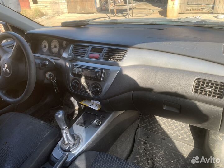 Mitsubishi Lancer 1.3 МТ, 2006, 402 610 км