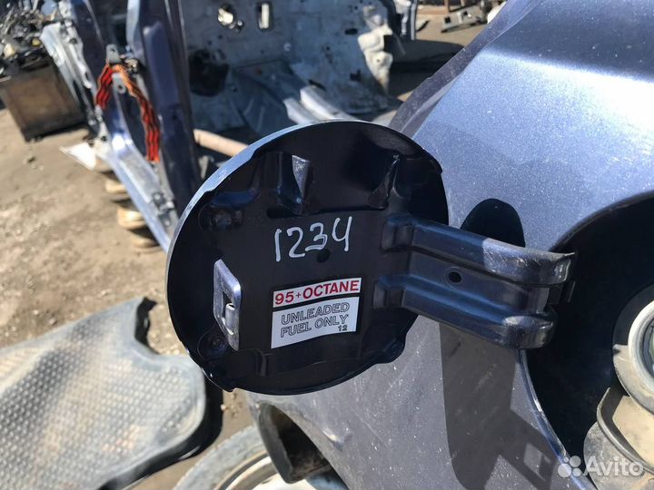 Лючок бензобака Mitsubishi Lancer X 10