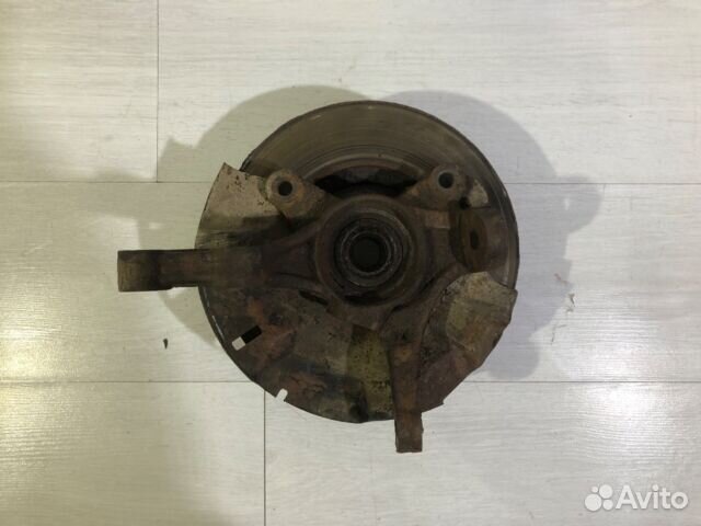 Поворотный кулак передний левый KIA RIO 3 1.6 ат с