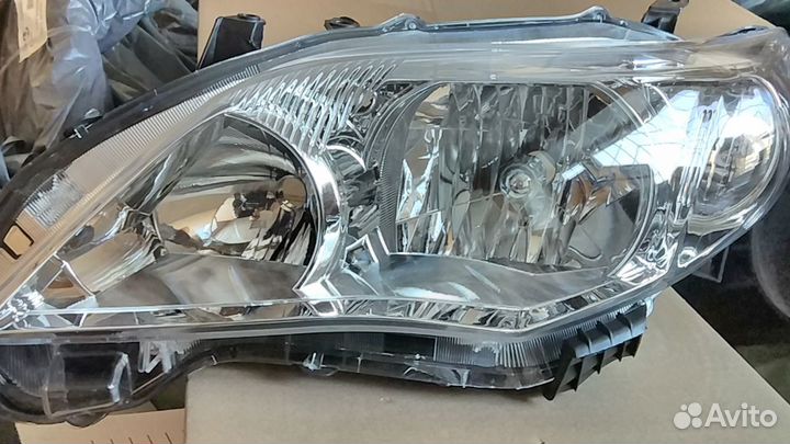 Фара левая Toyota Corolla E150 рестайлинг
