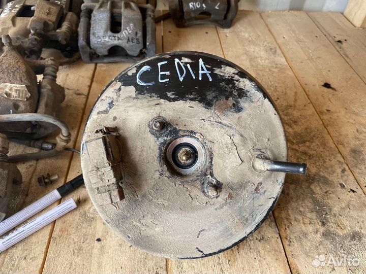 Вакуумный усилитель тормозов Lancer Cedia