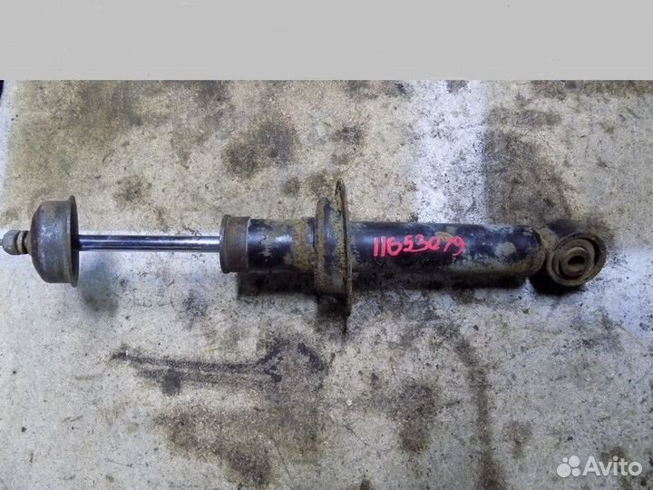 Амортизатор задний Primera P11E 1996-2002