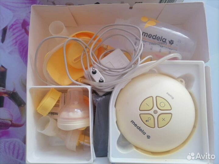 Молокоотсос medela swing электрический
