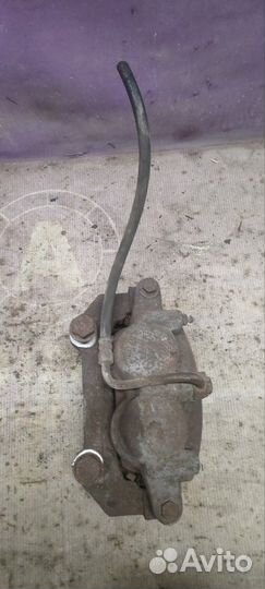 Суппорт тормозной передний правый Jeep Grand