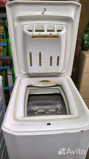 Стиральная машинка с вертикальной загрузкой