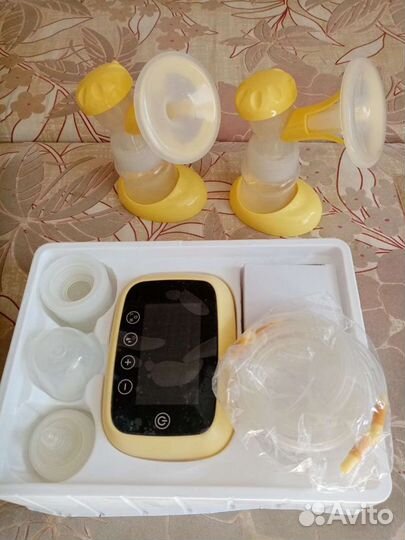 Молокоотсос электрический новый