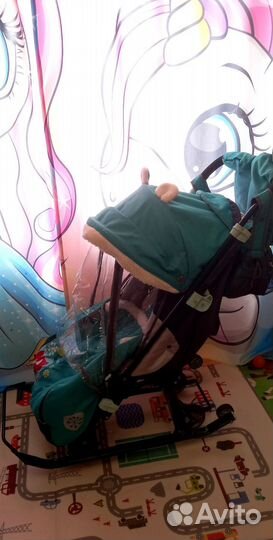 Детские санки - коляска с выдвижными колесами