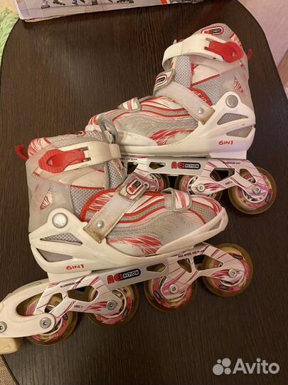 Роликовые коньки