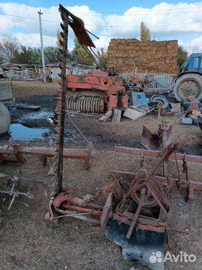 Косилка сегментная с граблями и ёмкость