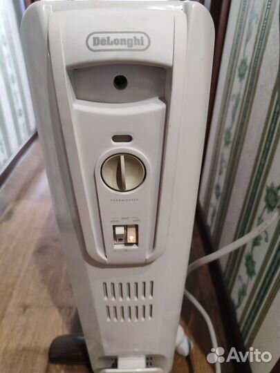 Масляный обогреватель delonghi,мощность-2500 вт