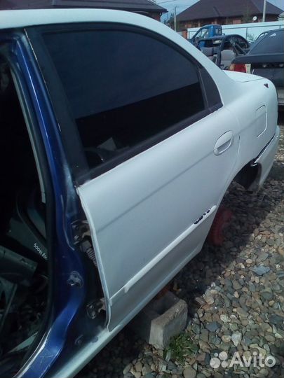 Задняя левая дверь Кия Спектра,Kia Spectra