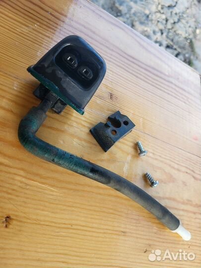 1997-02 мазда 626 форсунка омывателя фары Левая