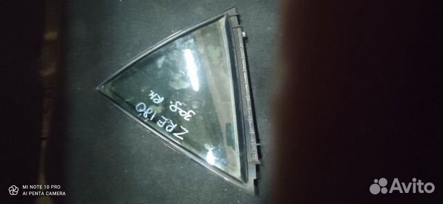 Стекло задней правой двери Toyota Corolla ZRE180