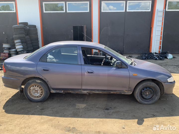 В разборе Mazda 323 BJ 1998 1.8 МКПП