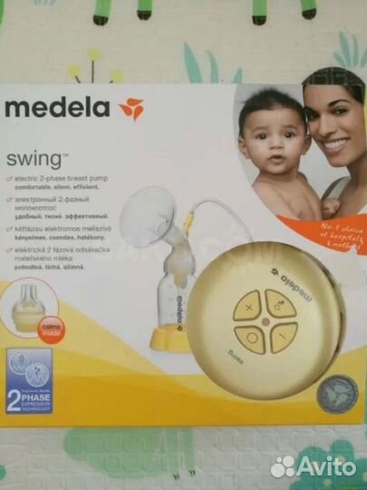 Молокоотсос medela электрический