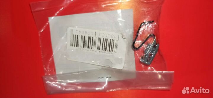 Пружина лючка бензобака Митсубиси mitsubishi