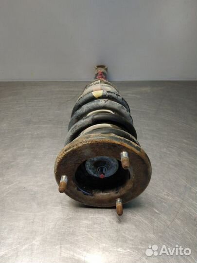 Стойка амортизатора передняя Mitsubishi L200 KB4T