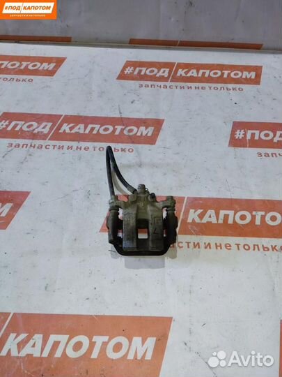 Суппорт тормозной задний левый Suzuki Grand Vitara