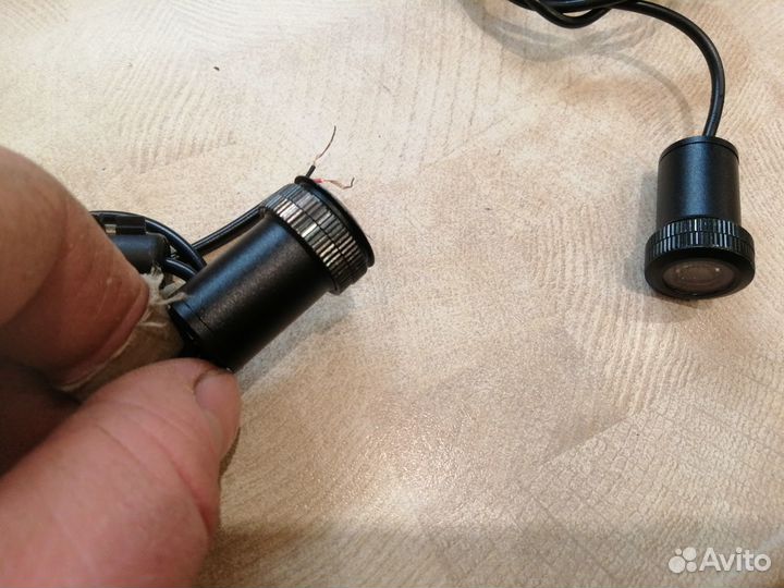 Проекция логотипа BMW глазок