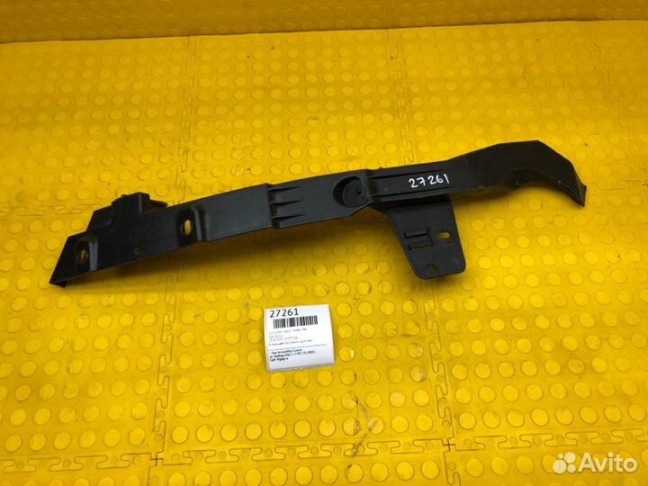 Кронштейн фары передний левый Opel Astra J