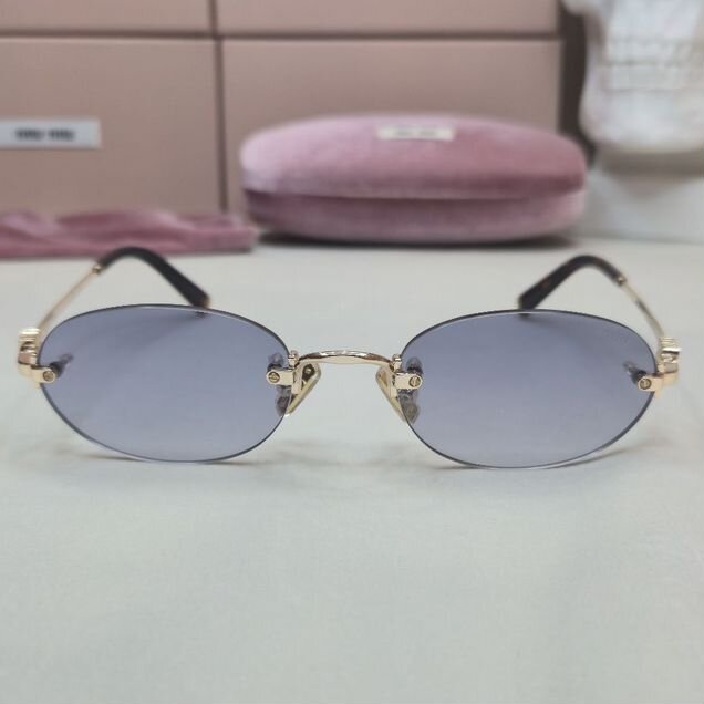 Солнцезащитные очки Miu Miu Gold Light Blue