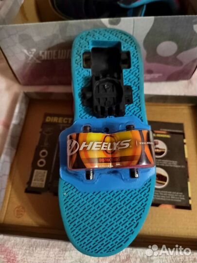 Роликовые кроссовки heelys