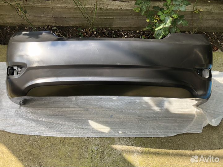 Задний некрашенный бампер Hyundai Solaris седан