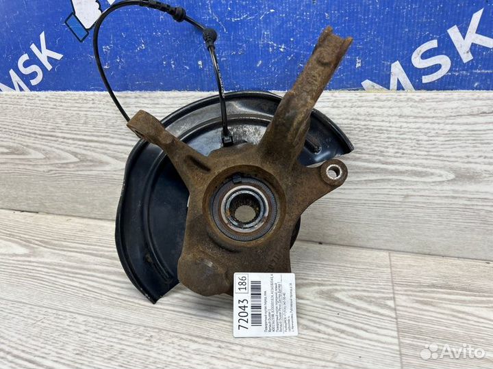 Поворотный кулак передний левый Renault Duster 1