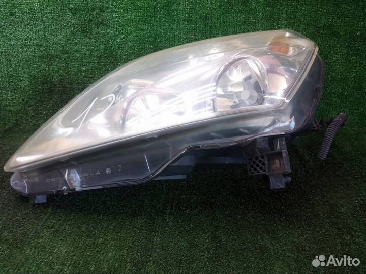 Фара левая Opel Zafira B (2005-2012)
