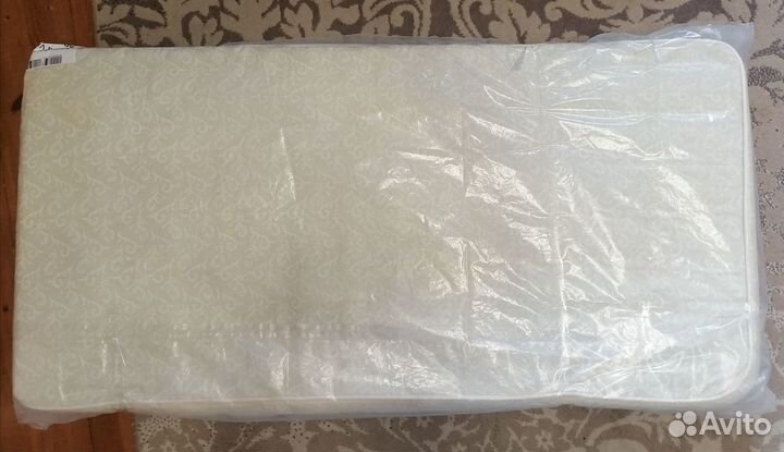 Детская кроватка с продольным маятником