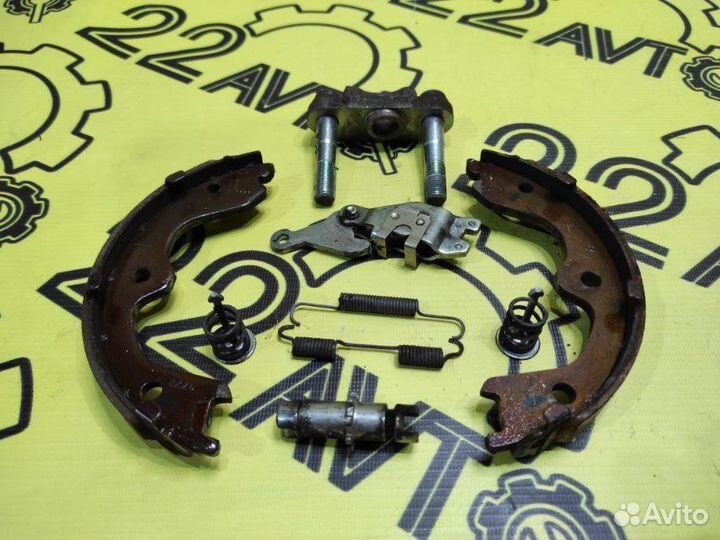 Механизм стояночного тормоза задний левый Nissan