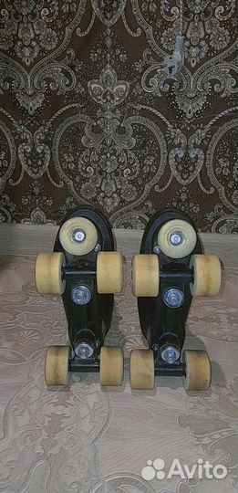 Роликовые коньки