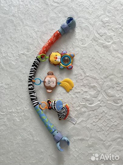 Дуга с игрушками