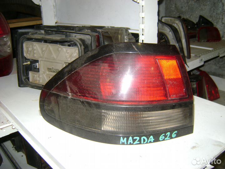 Фонарь внешний левый Мазда 626 гф Mazda 626 GF
