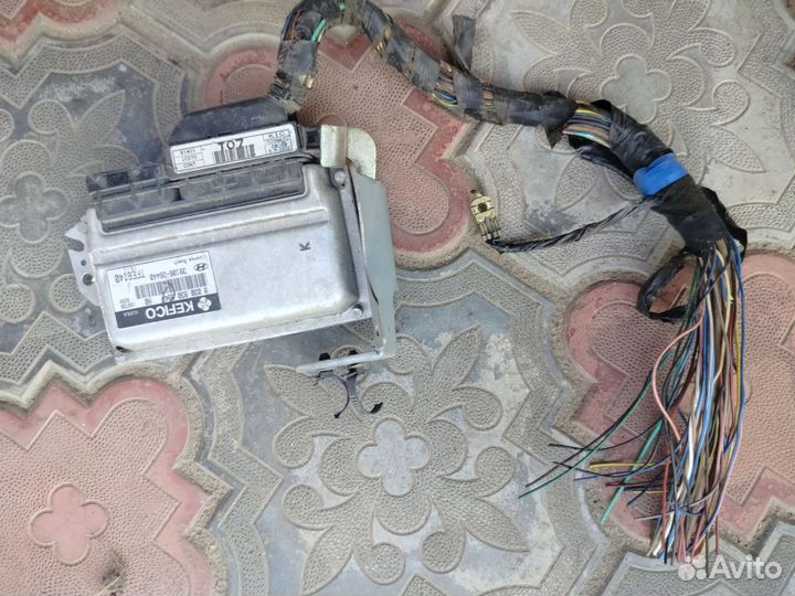 Блок управления двигателем hyundai getz 1.4