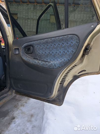 Дверные карты обшивка салона потолок Дэу Нексиа 1