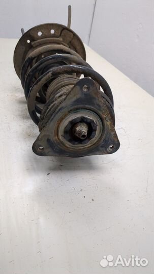 Амортизатор подвески левый передний Nissan Qashqai