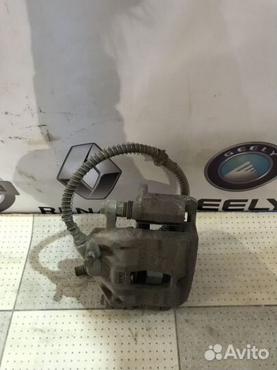 Суппорт тормозной перед Geely emgrand EC7 Лев