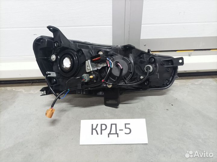 Фара левая Lancer X